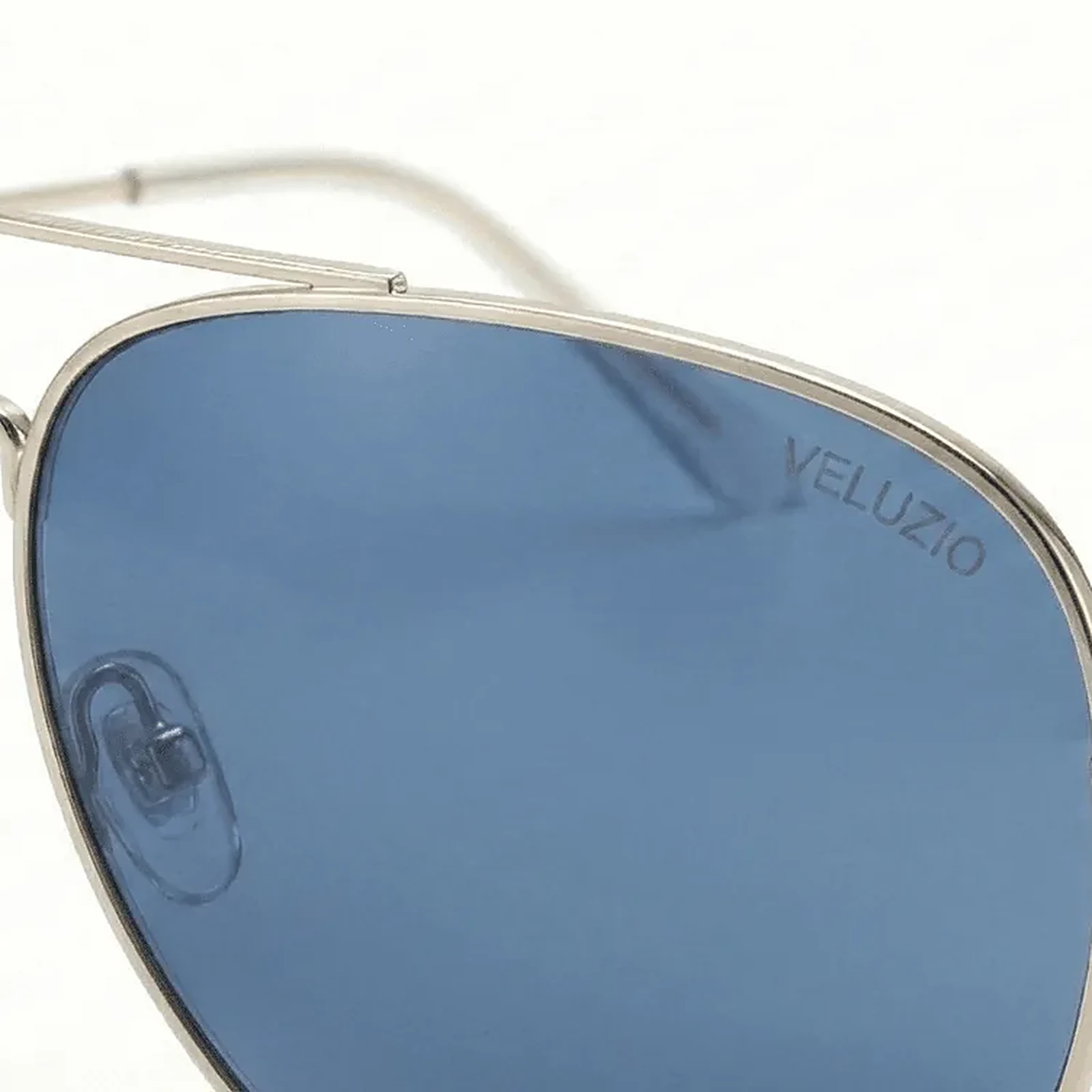 Occhiali da sole Veluzio Aviator in acciaio color argento con lenti blu – dettaglio lente e nasello